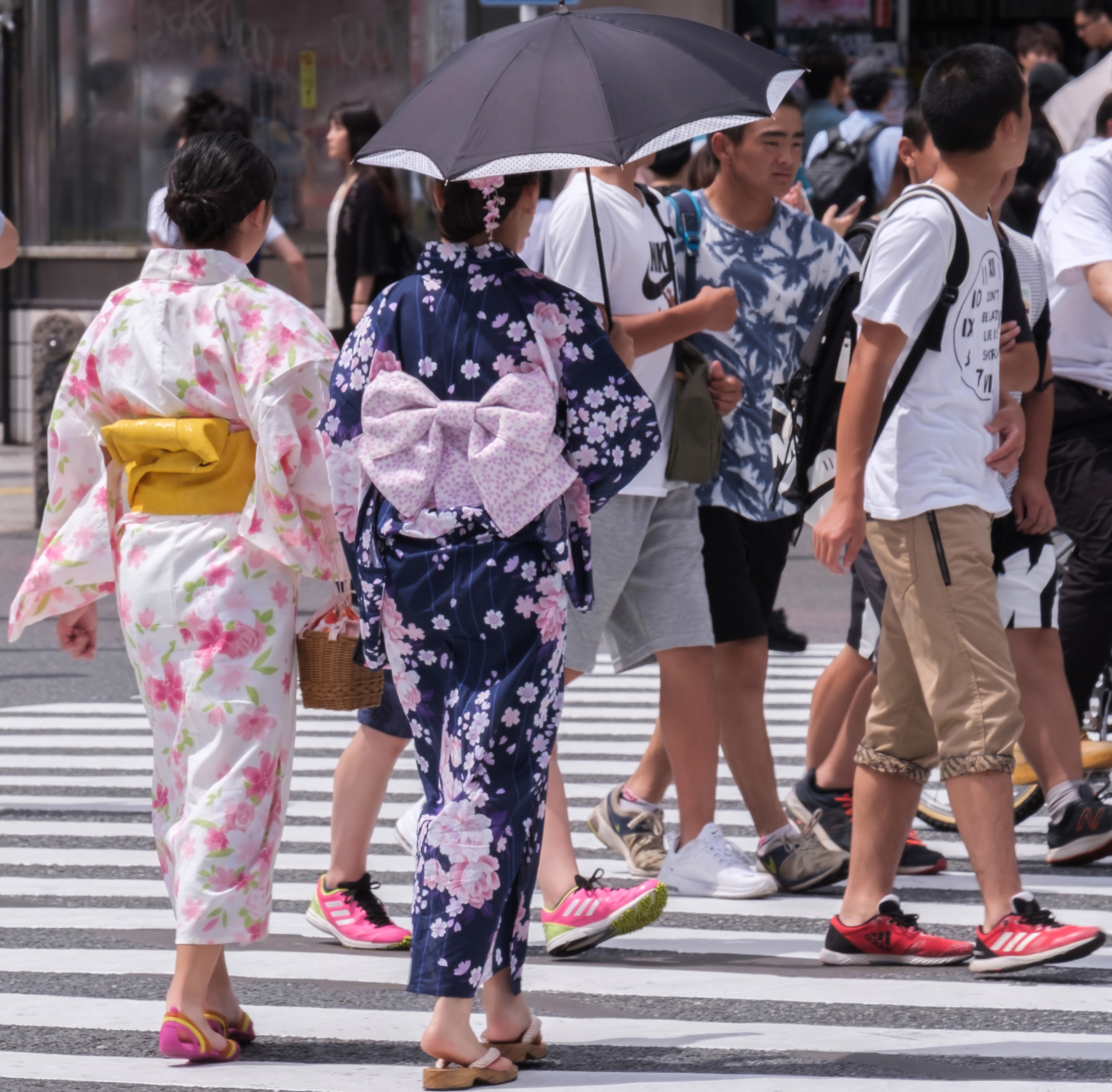 Der Sonnenschirm ist in Japan ein beliebter Schutz gegen die Hitze.